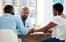 Fertility doctor consultation with patient discussing treatment options